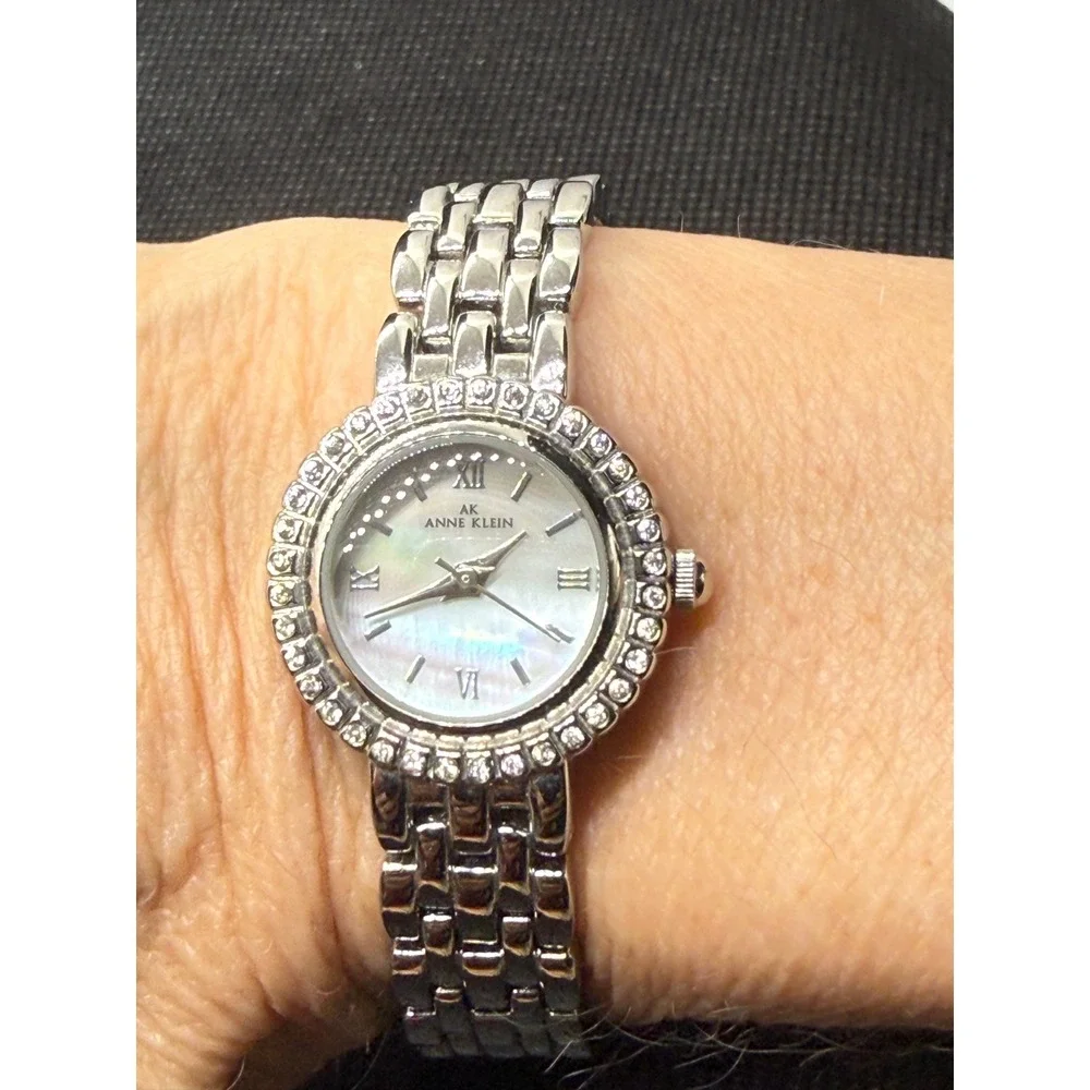 Anne Klein Womens Silver Tone Crystal Bezel Mother of Pearl Watch Needs Battery